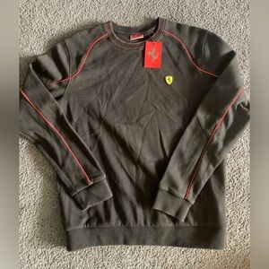Men’s black Ferrari pull over